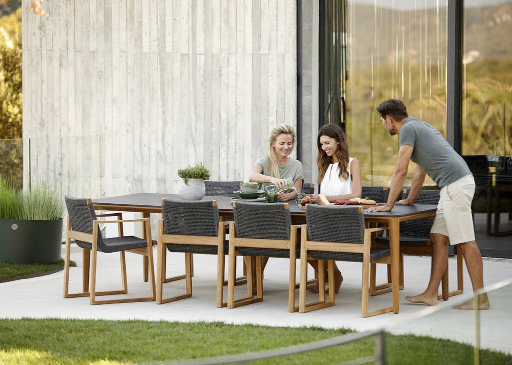 Exclusive outdoor dining table with teak dining chair