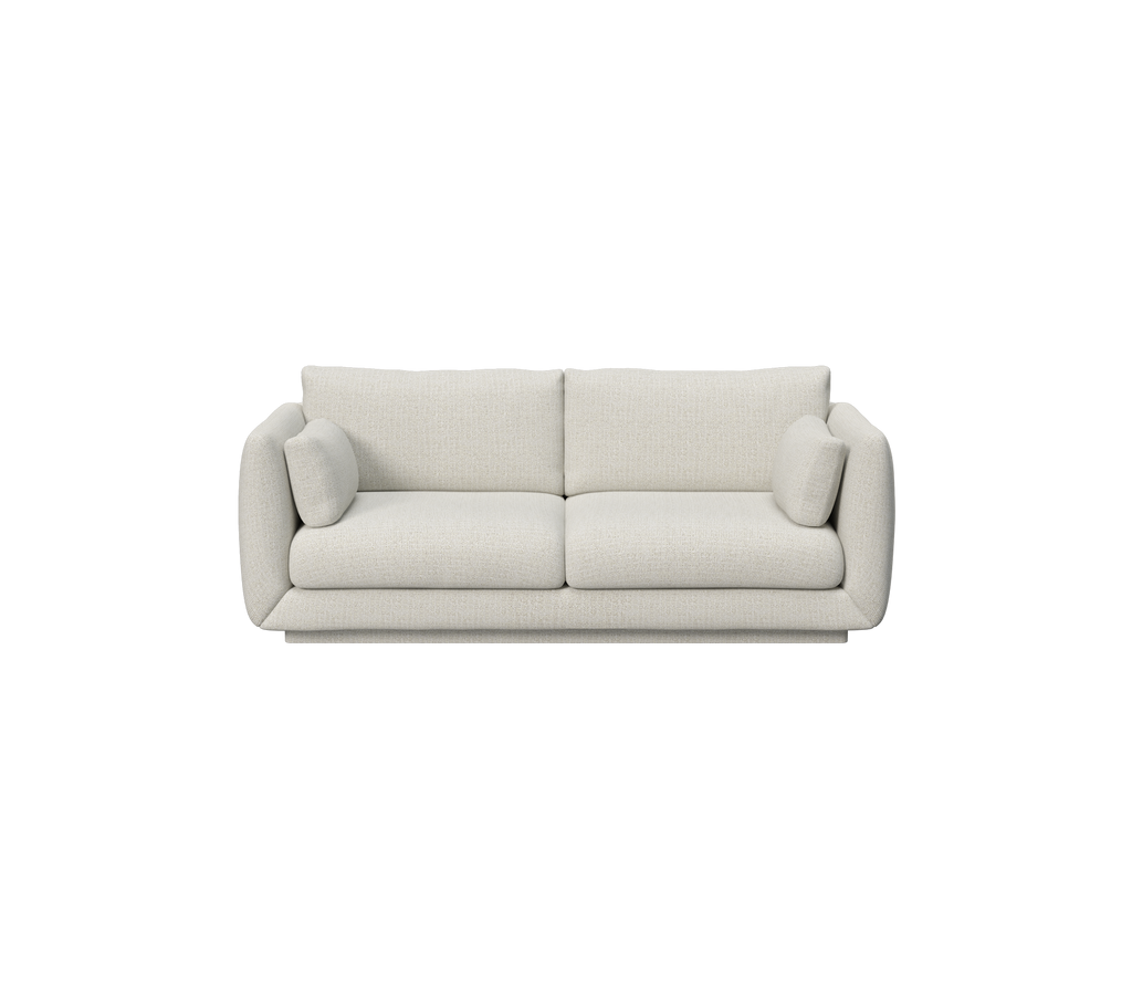 Sofá moderno en arena con un diseño minimalista.