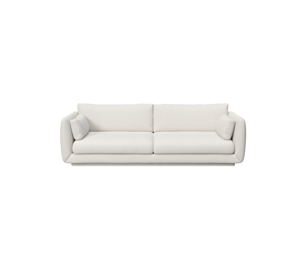 un sofá blanco moderno con un diseño minimalista.