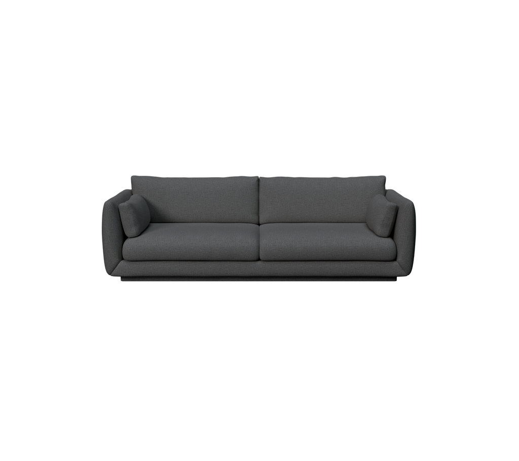 Sofá moderno de color verde oscuro con un diseño elegante y cojines cómodos.