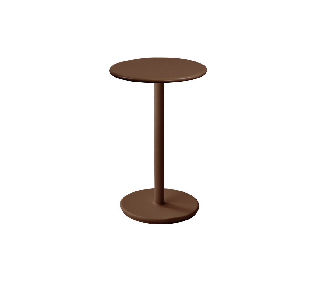 Mesa redonda moderna en color rojo desértico.