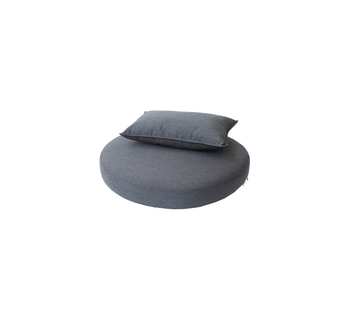 Cojín redondo en una tela gris oscuro, rematado con una almohada rectangular más pequeña, diseñado para comodidad y relajación.