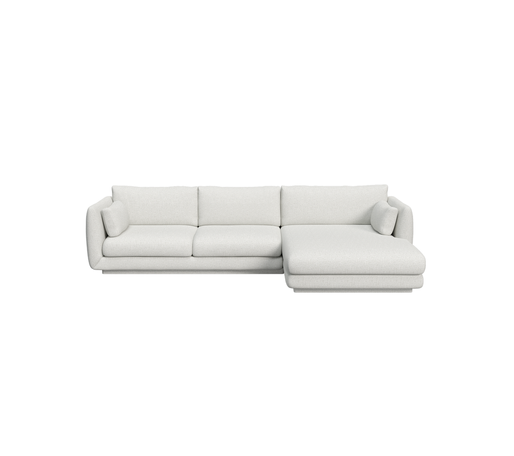 Sofá moderno gris claro con un diseño minimalista.