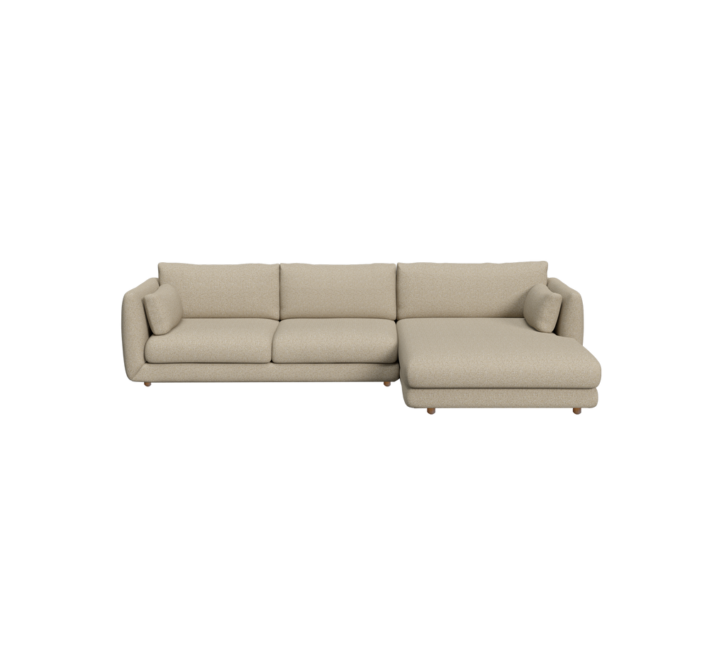 Sofá beige moderno con un diseño seccional.