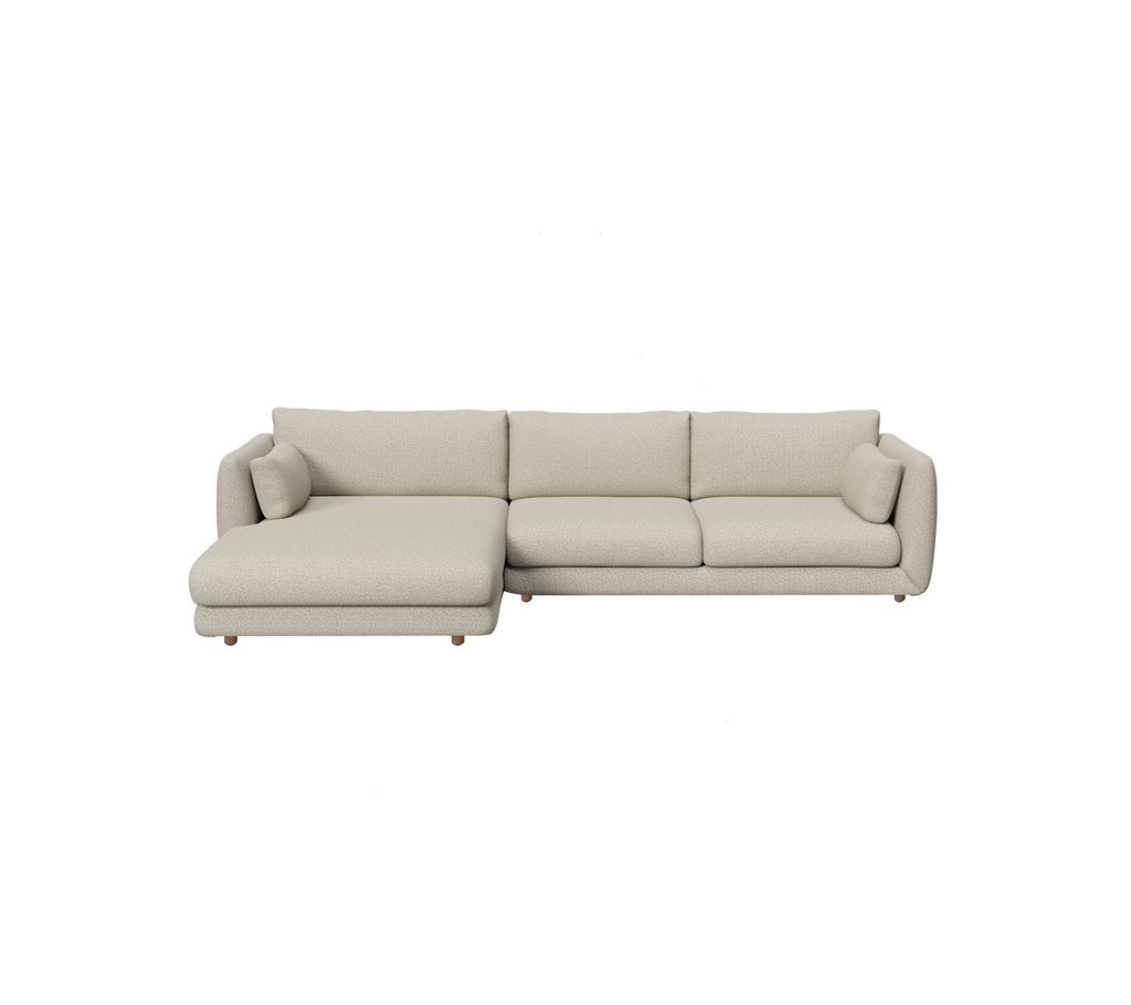 Sofá moderno de color marrón claro con una chaise longue espaciosa.