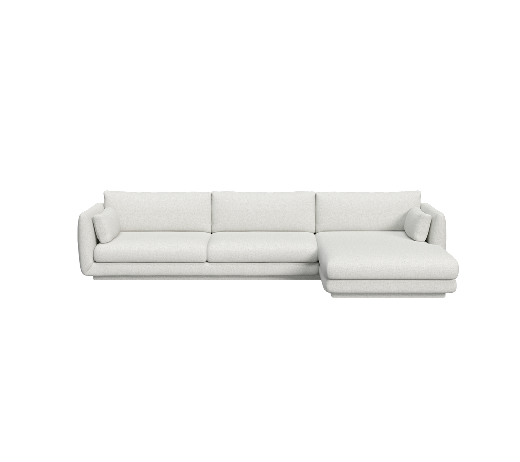 Sofá moderno gris claro con un chaise longue.