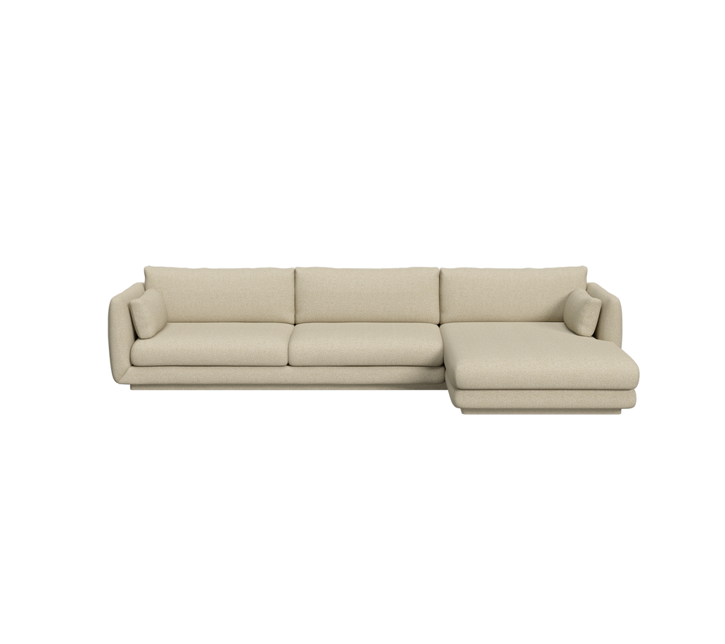 Sofá moderno marrón claro con diseño de chaise lounge.