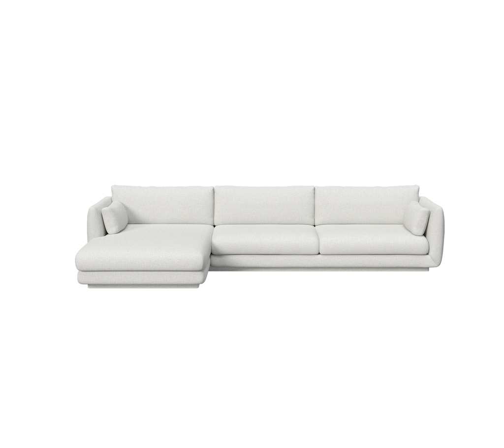 Sofá moderno gris claro con diseño de chaise longue.