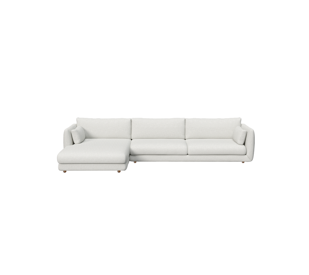 Sofá moderno de color gris claro con líneas limpias y un diseño minimalista.