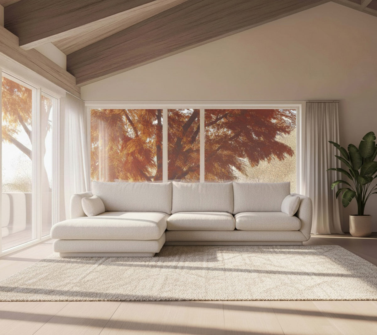 Sofá blanco moderno y alfombra beige en un ambiente de salón minimalista.